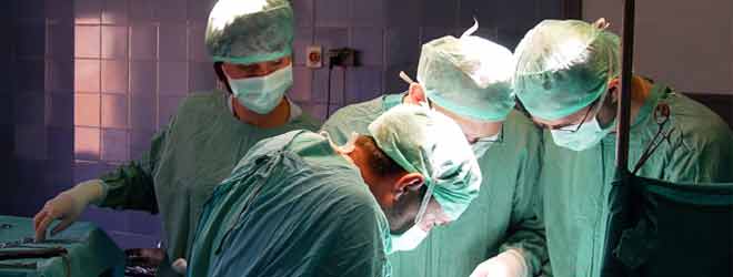 Doctors performing amputation surgery
