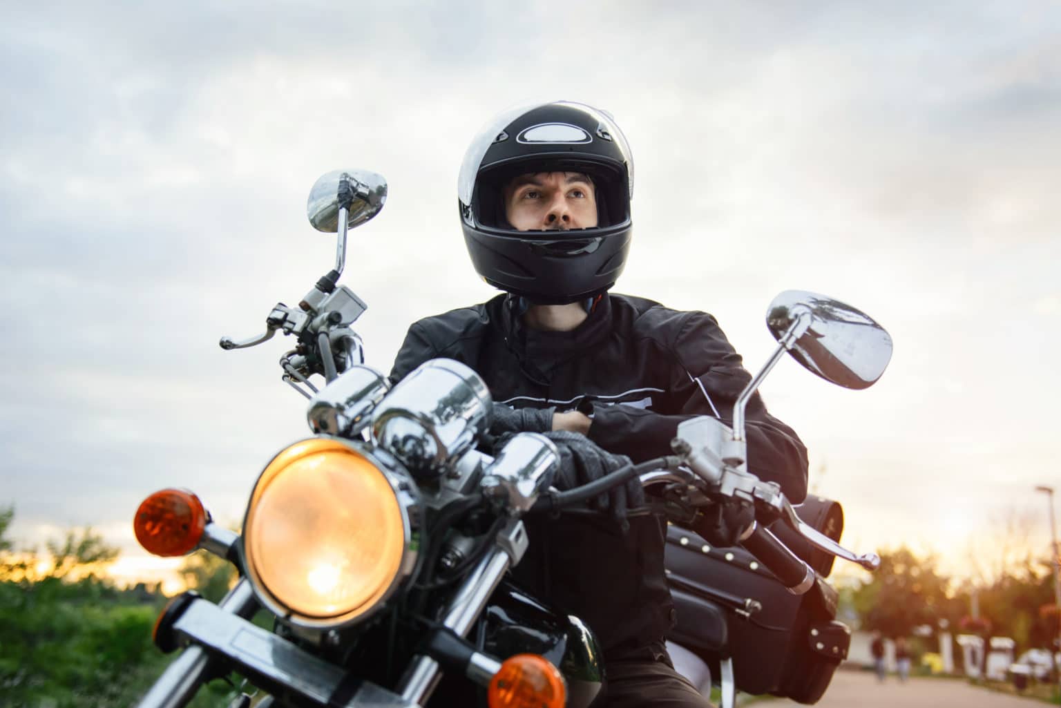 Motorcycle rider sitting on his bike