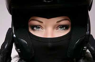 Woman wearing a motorcycle helmet