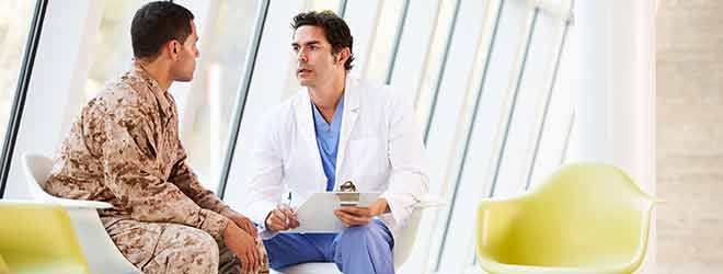 Soldier talking with doctor