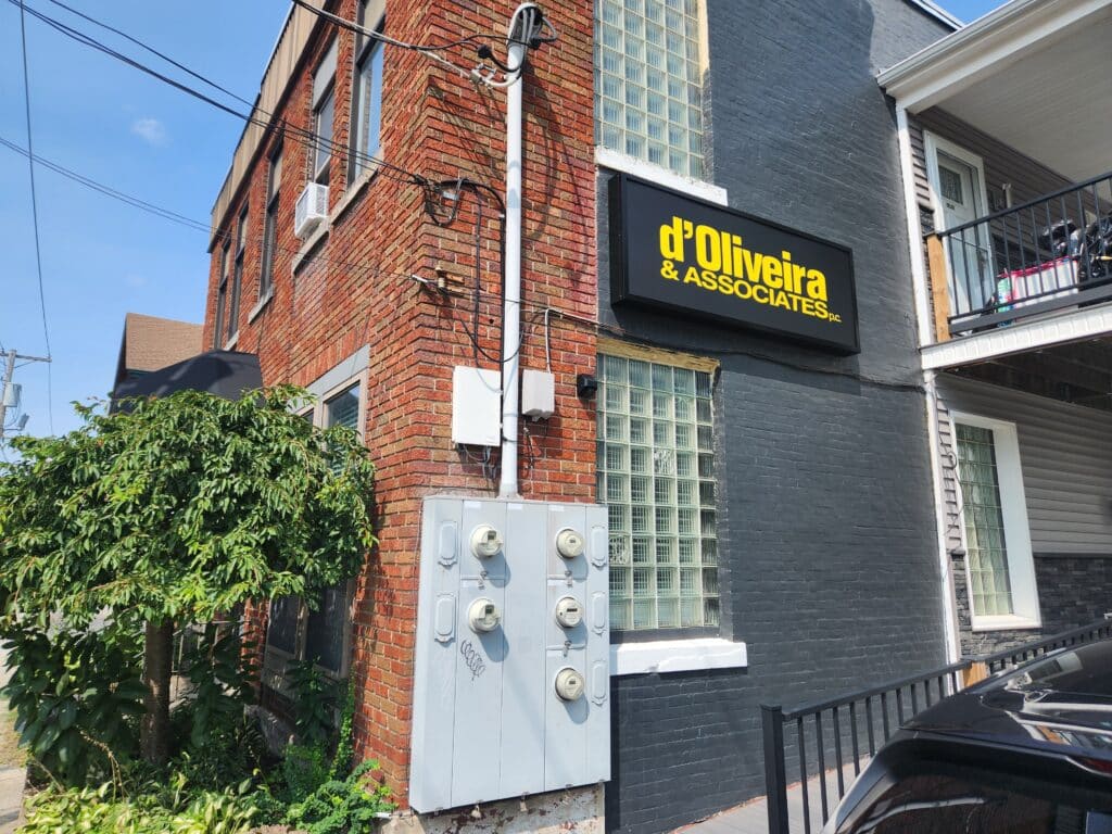 Signage for d'Oliveira & Associates at Woonsocket, RI.