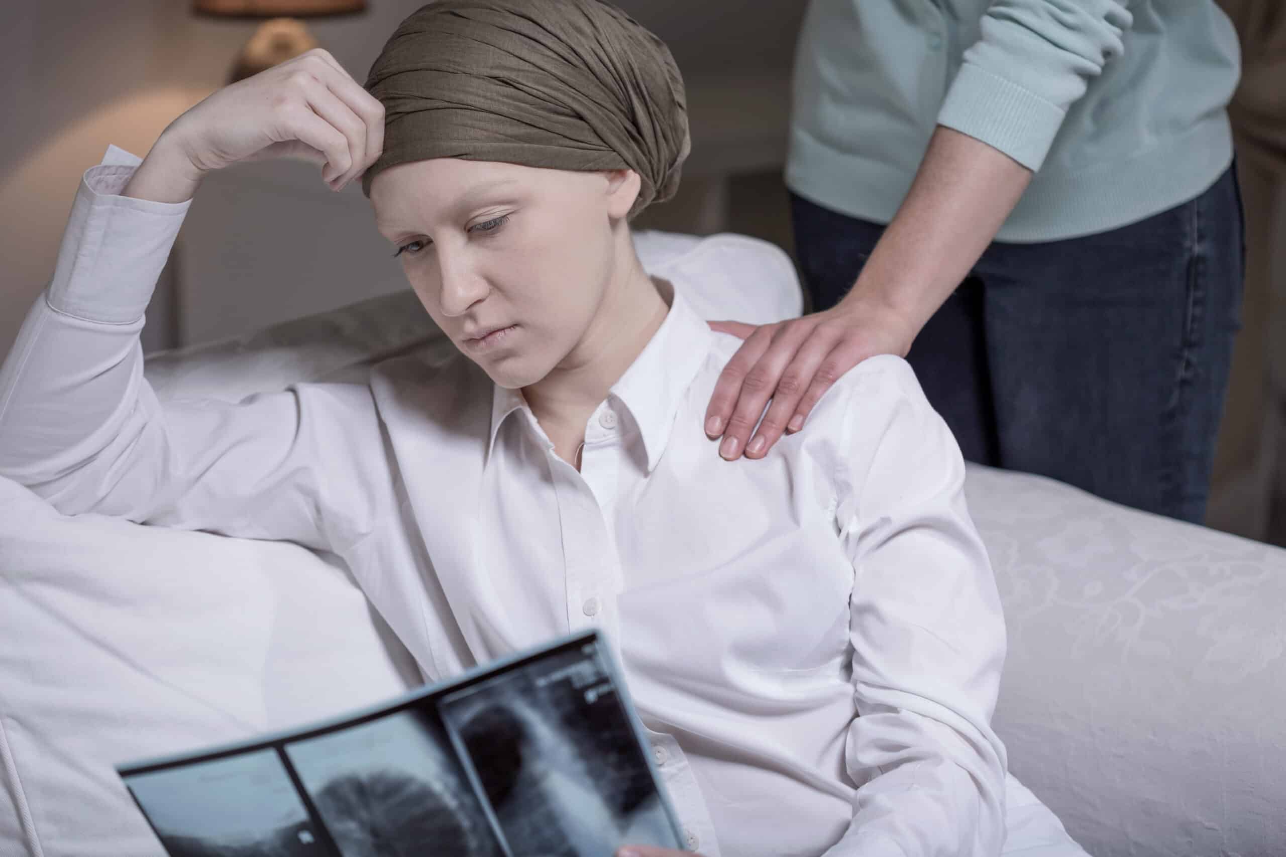 A woman reviewing her cancer x-rays.