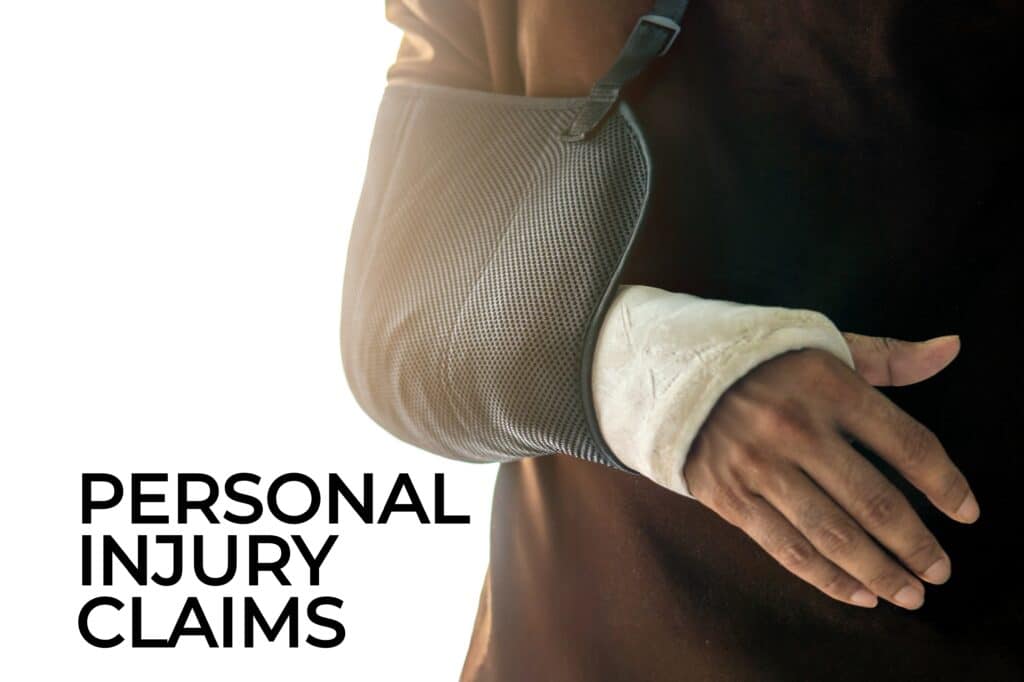 A man in an arm cast and held in a sling.